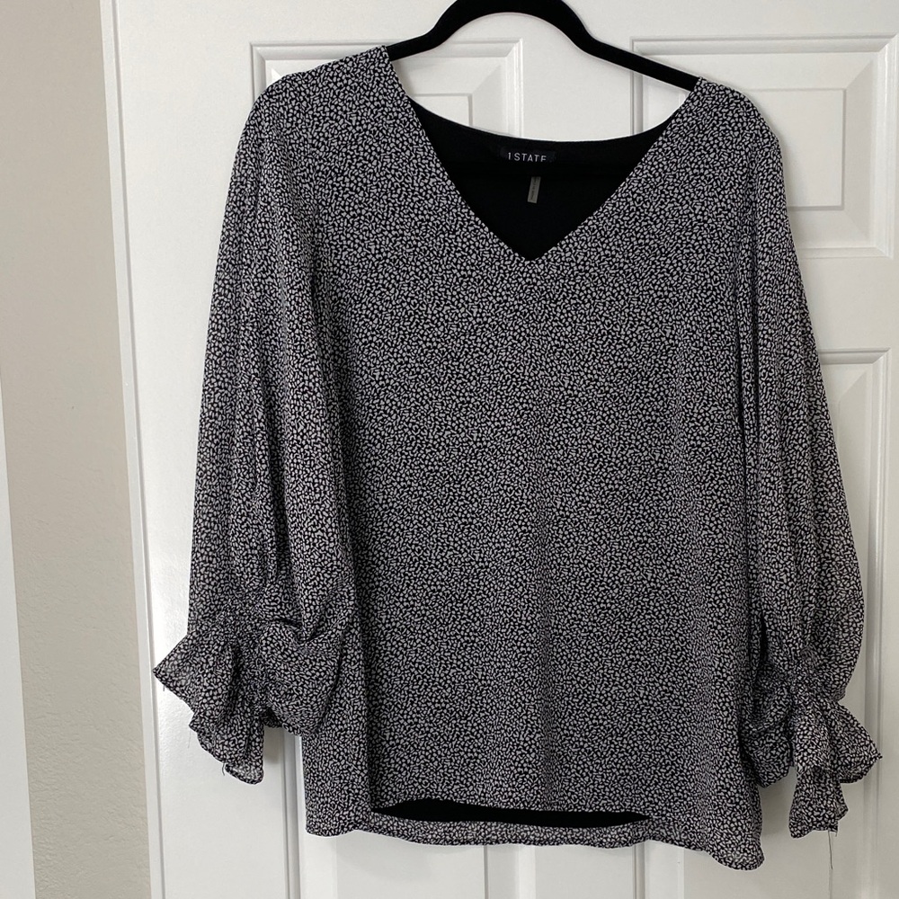 1. State Black and White Patterned Blouse